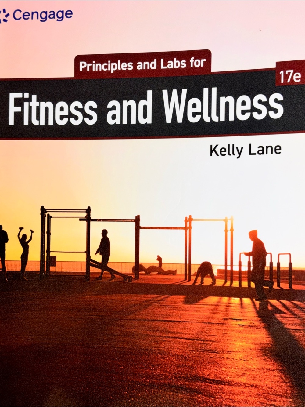 Fitness and Wellness Textbook by Cengage - Sunset Orange Cover